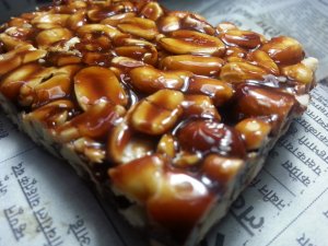 Peanut chikki a popular foodstuff of jaggery and peanut is available commercially all over India